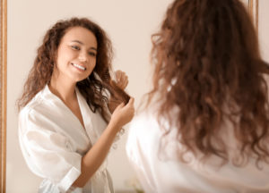 Is Hard Water Harmful to Hair? - Women Brushing Her Hair