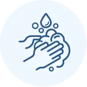 Line drawing of two hands being washed with soap and water, with bubbles and a water droplet above, on a light blue circular background.