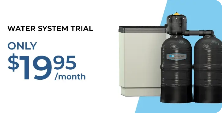 Image showing a water filtration system with text: Water System Trial. Only $19.95/month. The system has two large black tanks connected to a rectangular unit. The background is white and light blue.